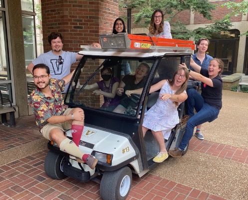 Macdonald group in a golf cart